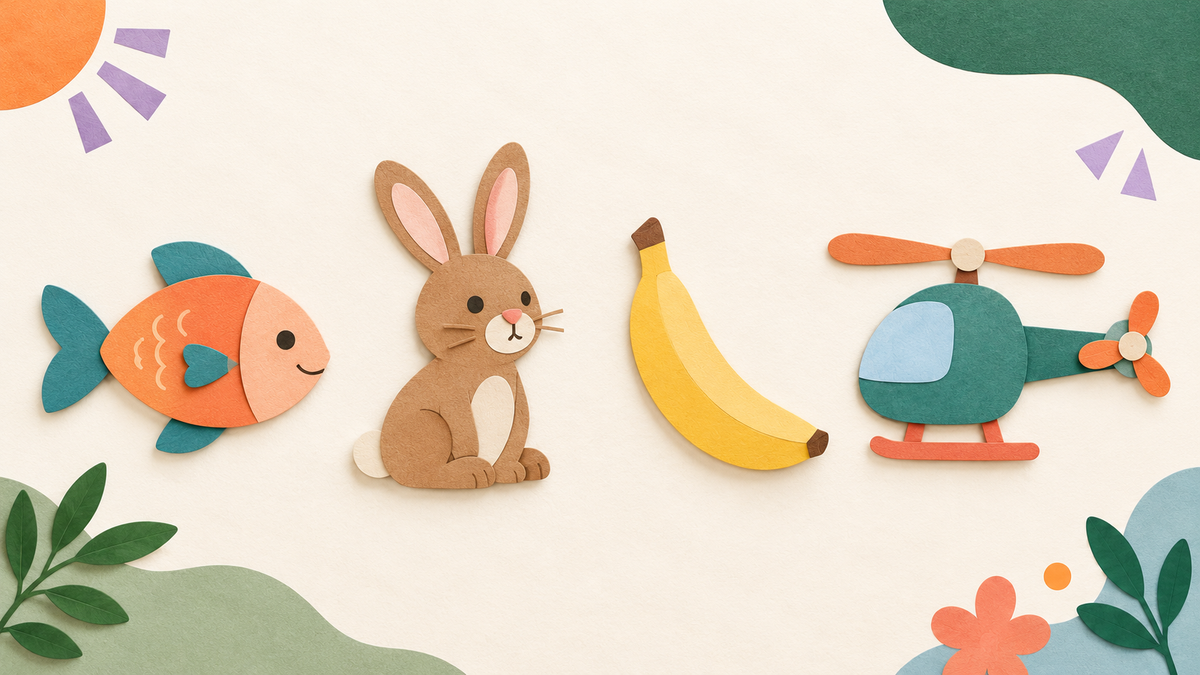 Cut-paper pictures of a fish, rabbit, banana and toy helicopter on cream paper